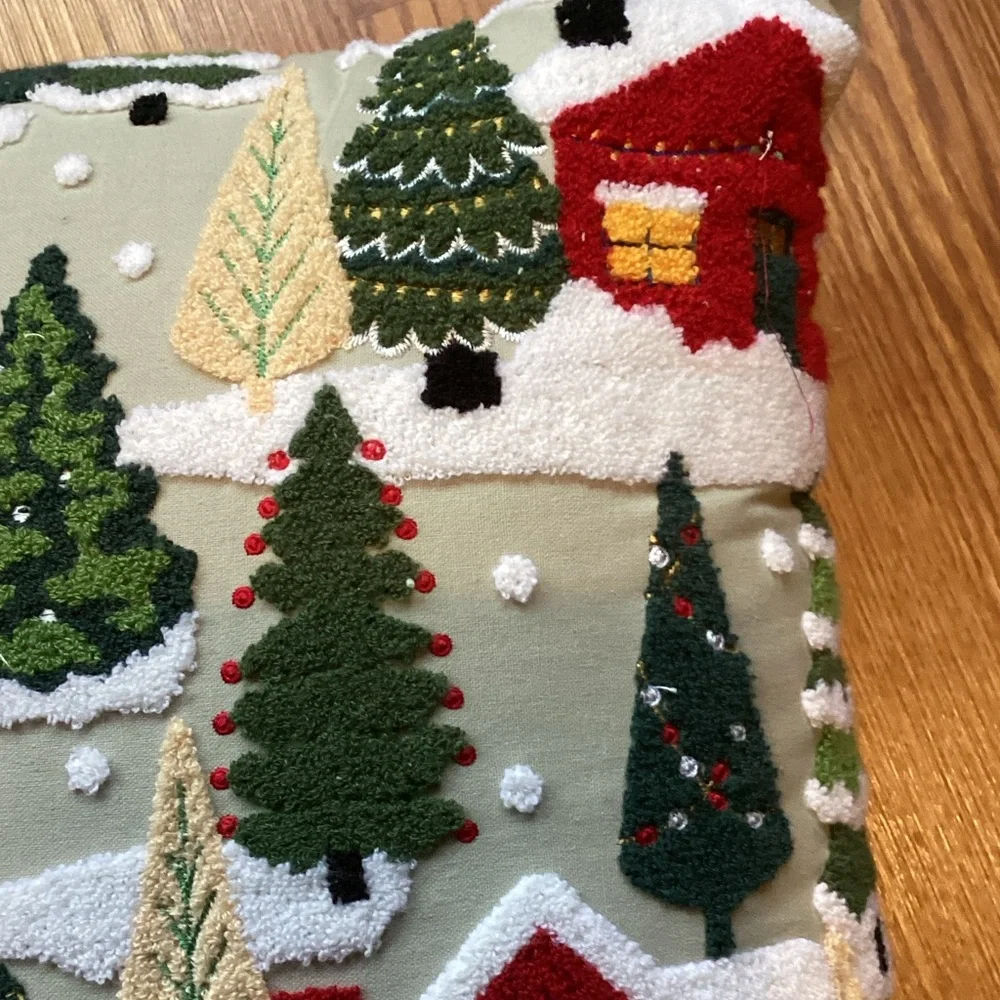 Cozy Holiday Village Pillow with Red and Green Design